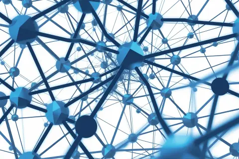 A geometric illustration representing the intersection of AI, content, and compensation models.